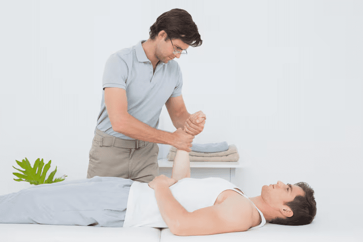 Above: Friction massage applied to the connective tissues surrounding the elbow