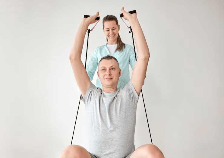 Above: Shoulder toning exercises supervised by experienced physiotherapist