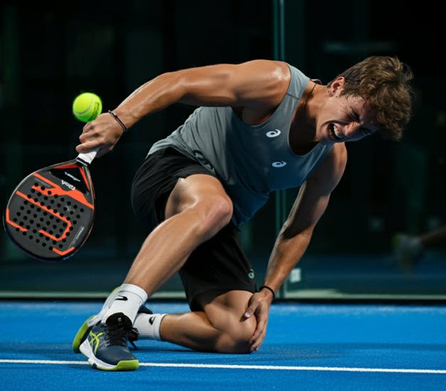 Physiotherapist assessing an injured padel player
